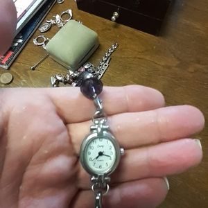Beautiful watch with purple amethyst stones
